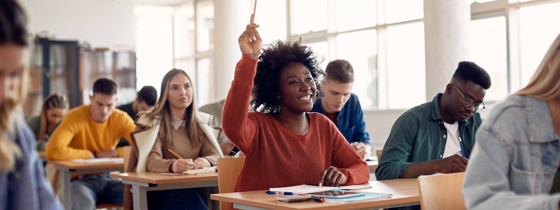 Per diem nurse raising her hand in class Per diem nurse raising her hand in class