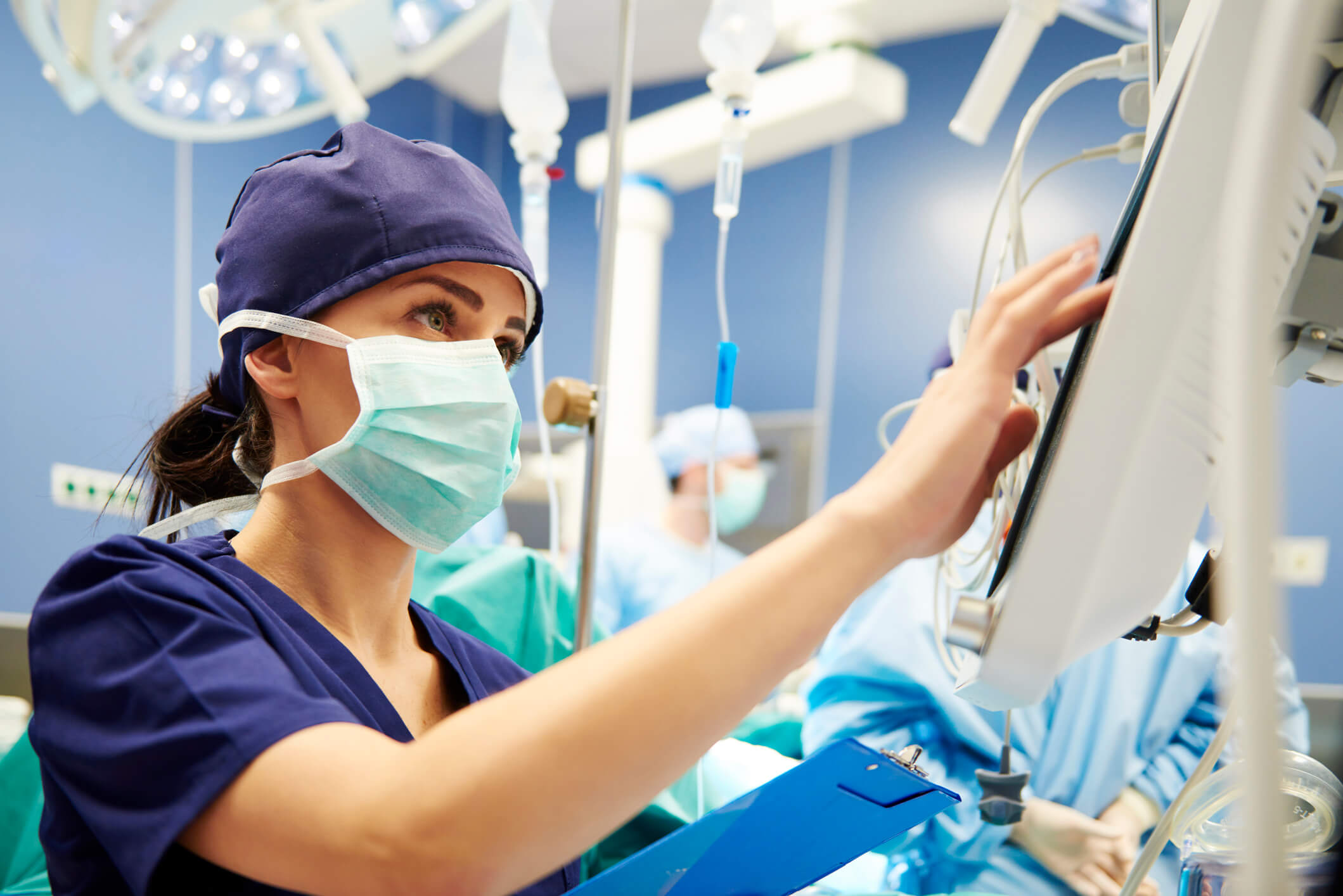 OR Nurse working on electronic charting OR Nurse working on electronic charting